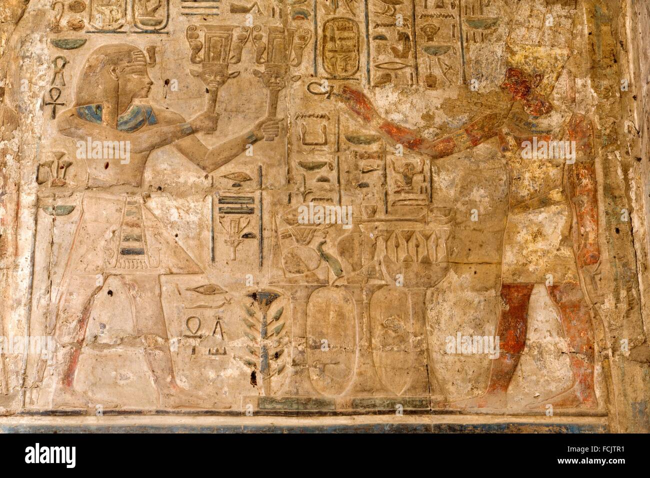 Bas-relief, Ramses II (left), God Amun (right), Luxor Temple, Luxor, Egypt Stock Photo