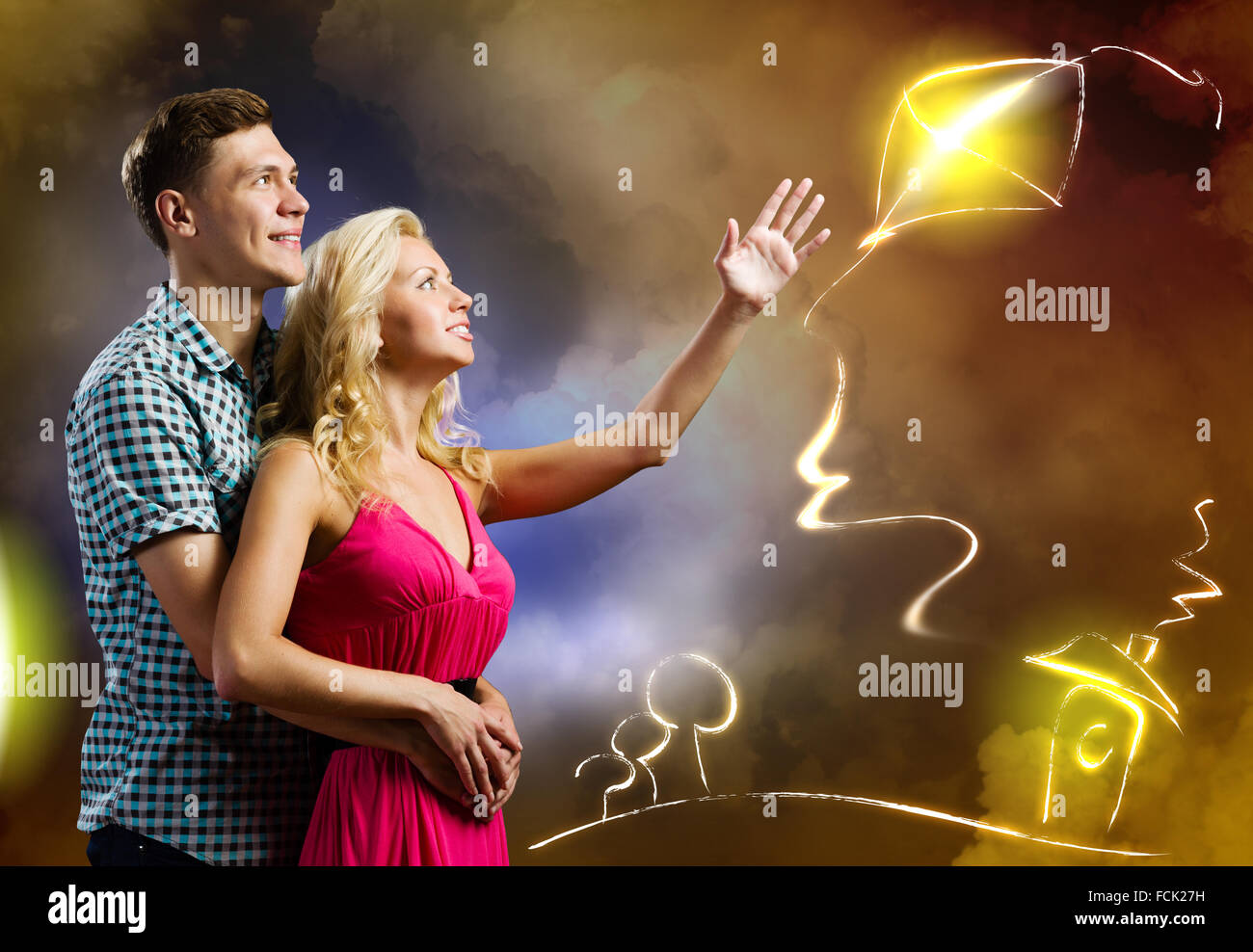 Young happy couple dreaming about family and future life Stock Photo