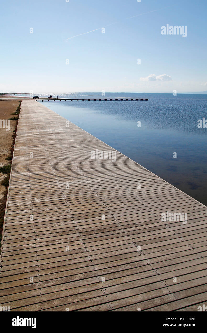 Footpath made of wood, next to the sea Stock Photo