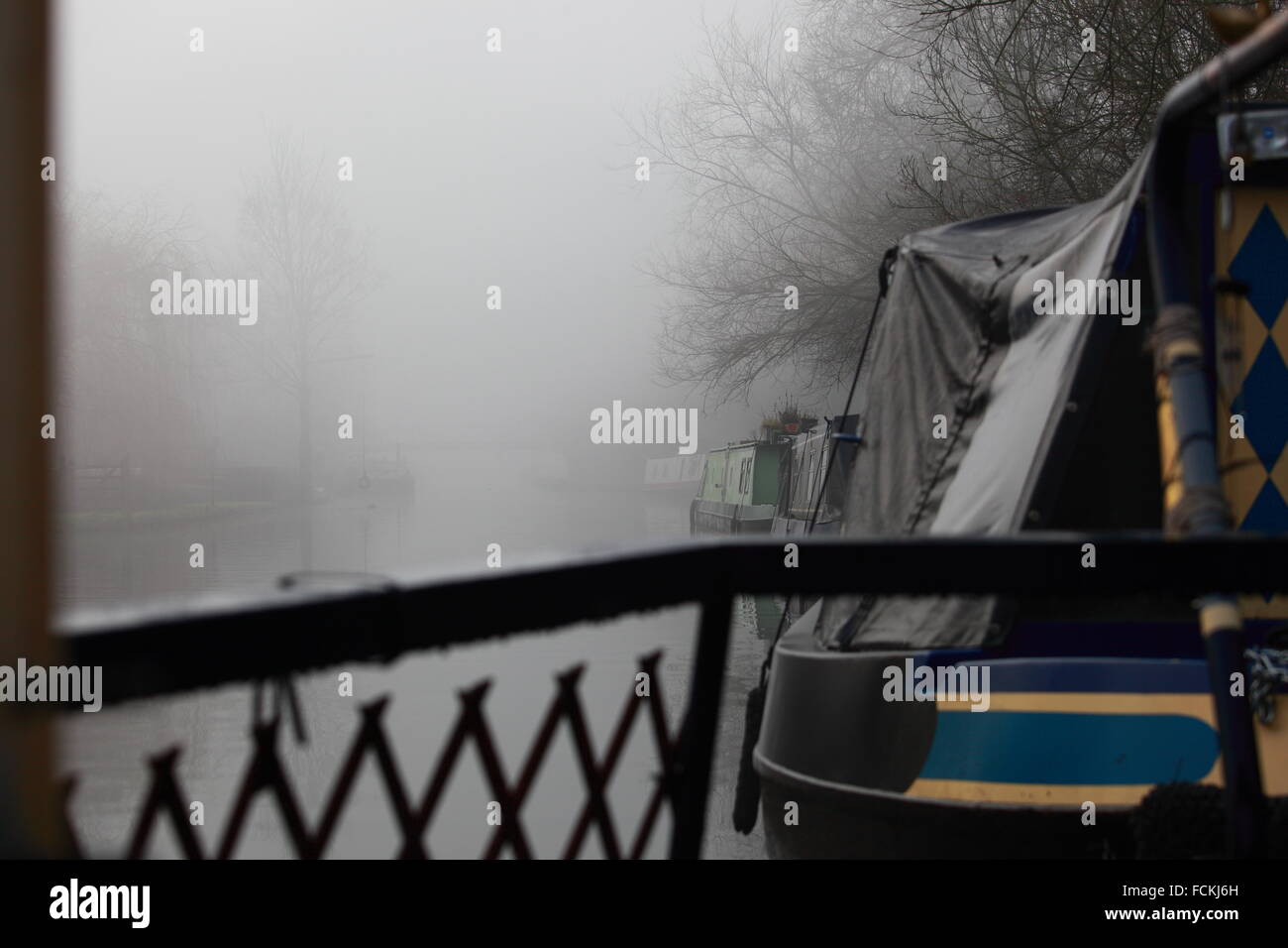 Mist and boats on the Grand Union Canal Stock Photo