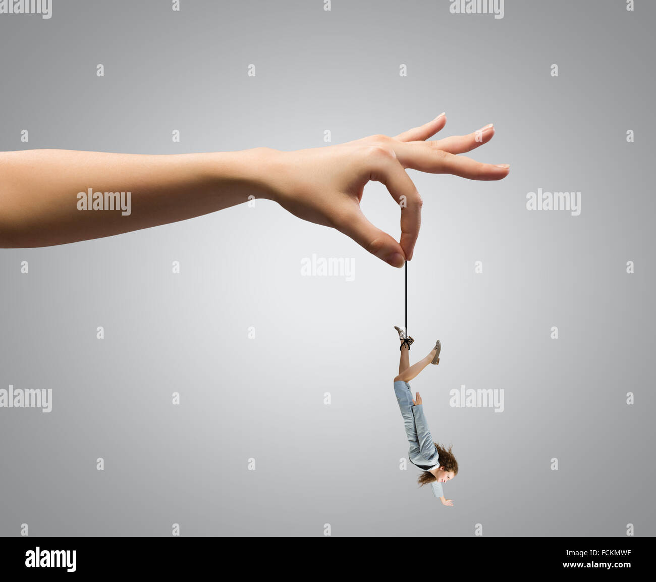 Giant human hand holding miniature hi-res stock photography and images ...