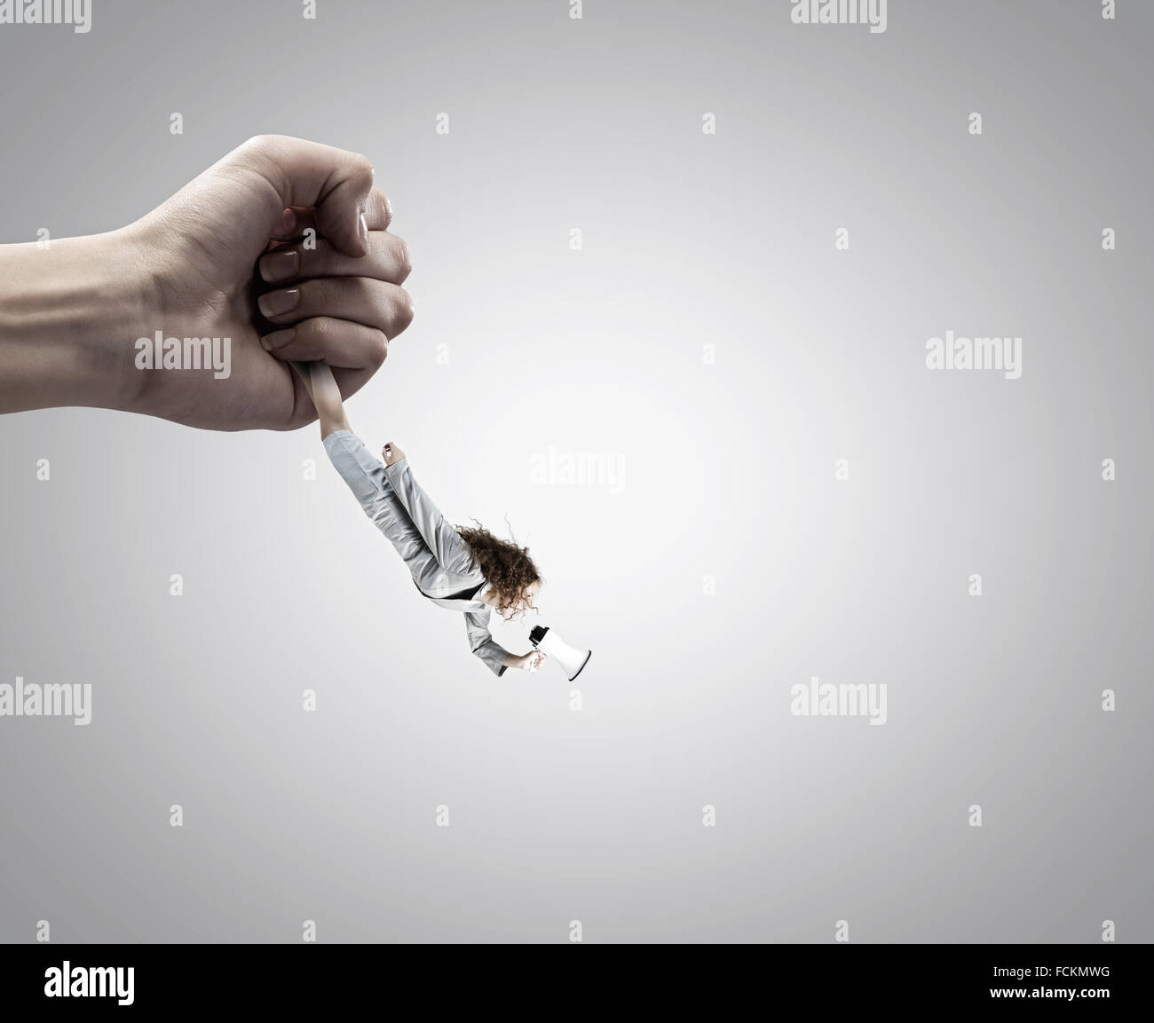 Giant human hand holding miniature hi-res stock photography and images ...