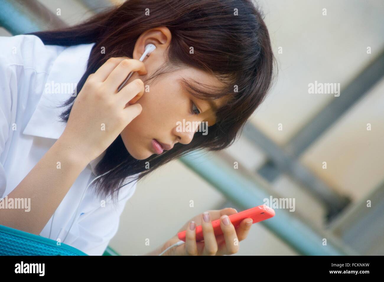 Japanese girl with smartphone Stock Photo