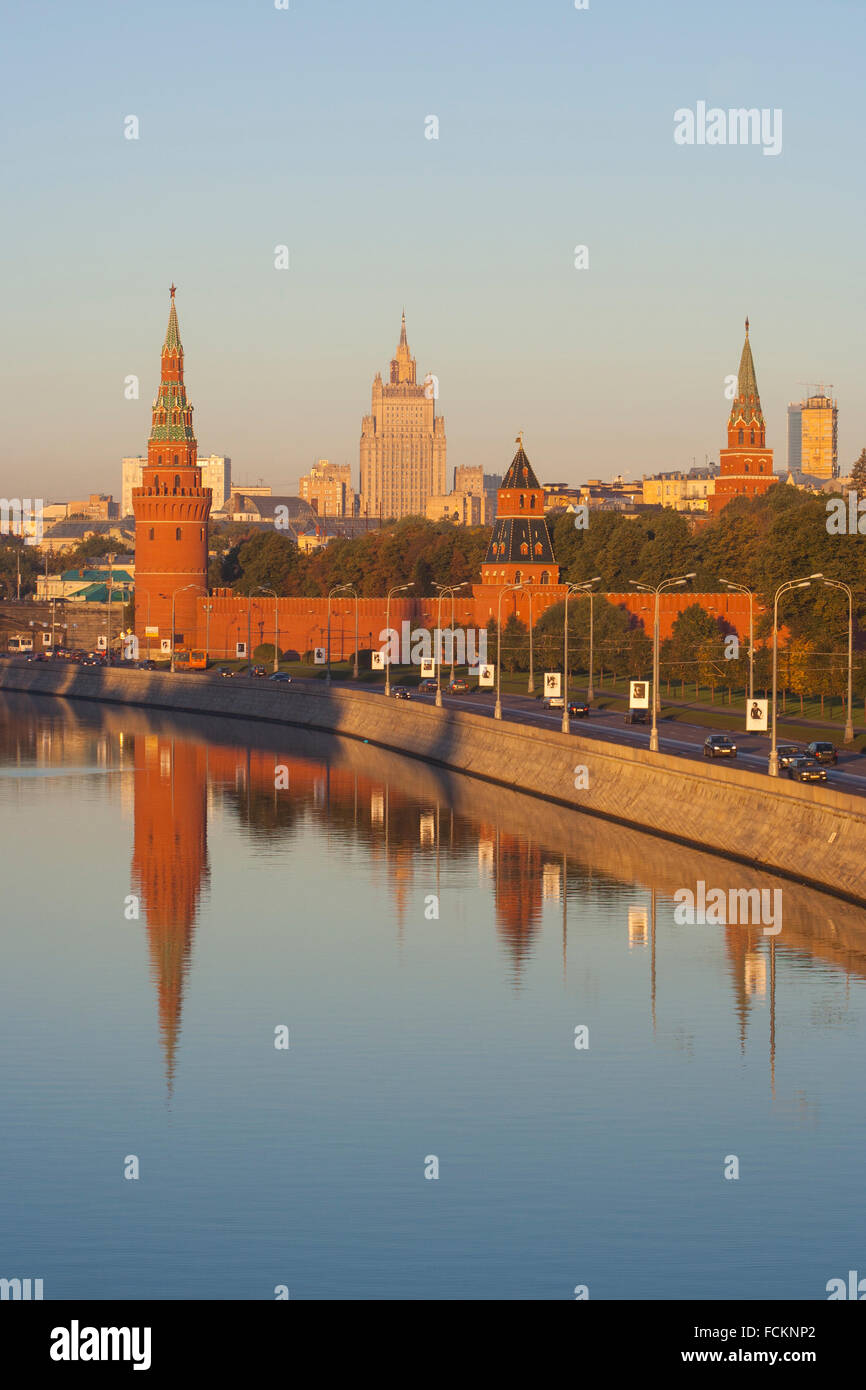 Kremlin Towers and Foreign Ministry reflected in the Moskva River, early morning, Moscow, Russia Stock Photo