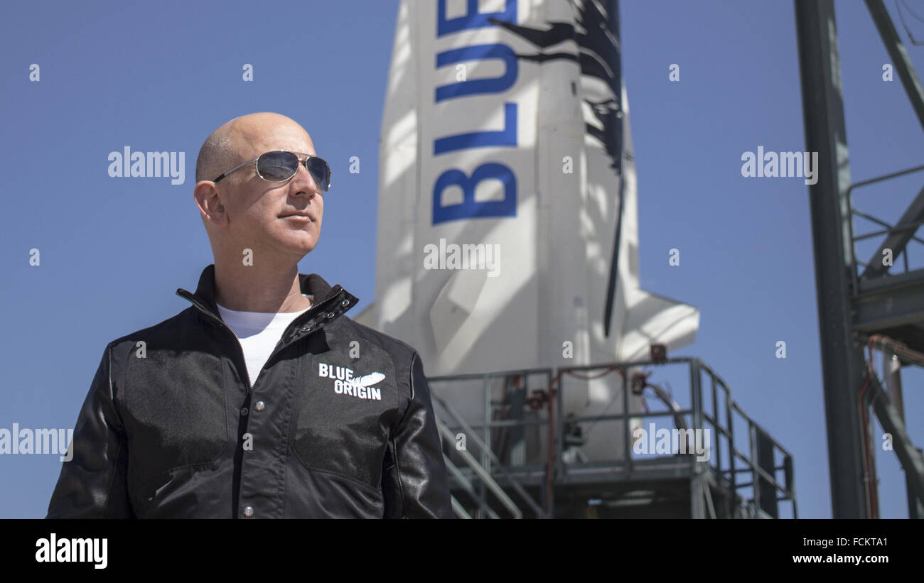 Jeff Bezos, founder of Blue Origin inspects the New Shepard reusable rocket at the west Texas proving grounds before the maiden voyage April 29, 2015 in Van Horn, Texas. Stock Photo