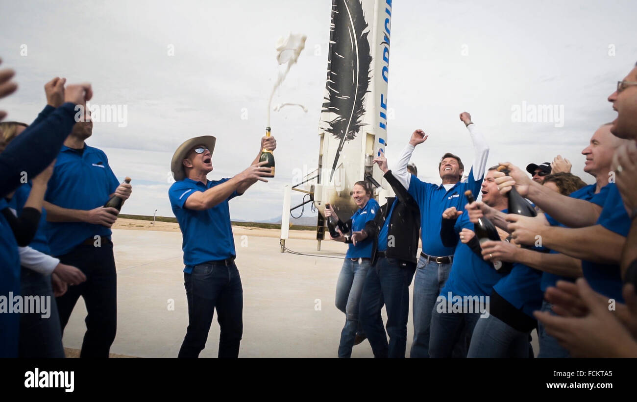 Jeff Bezos celebrates with his team following the successful launch and