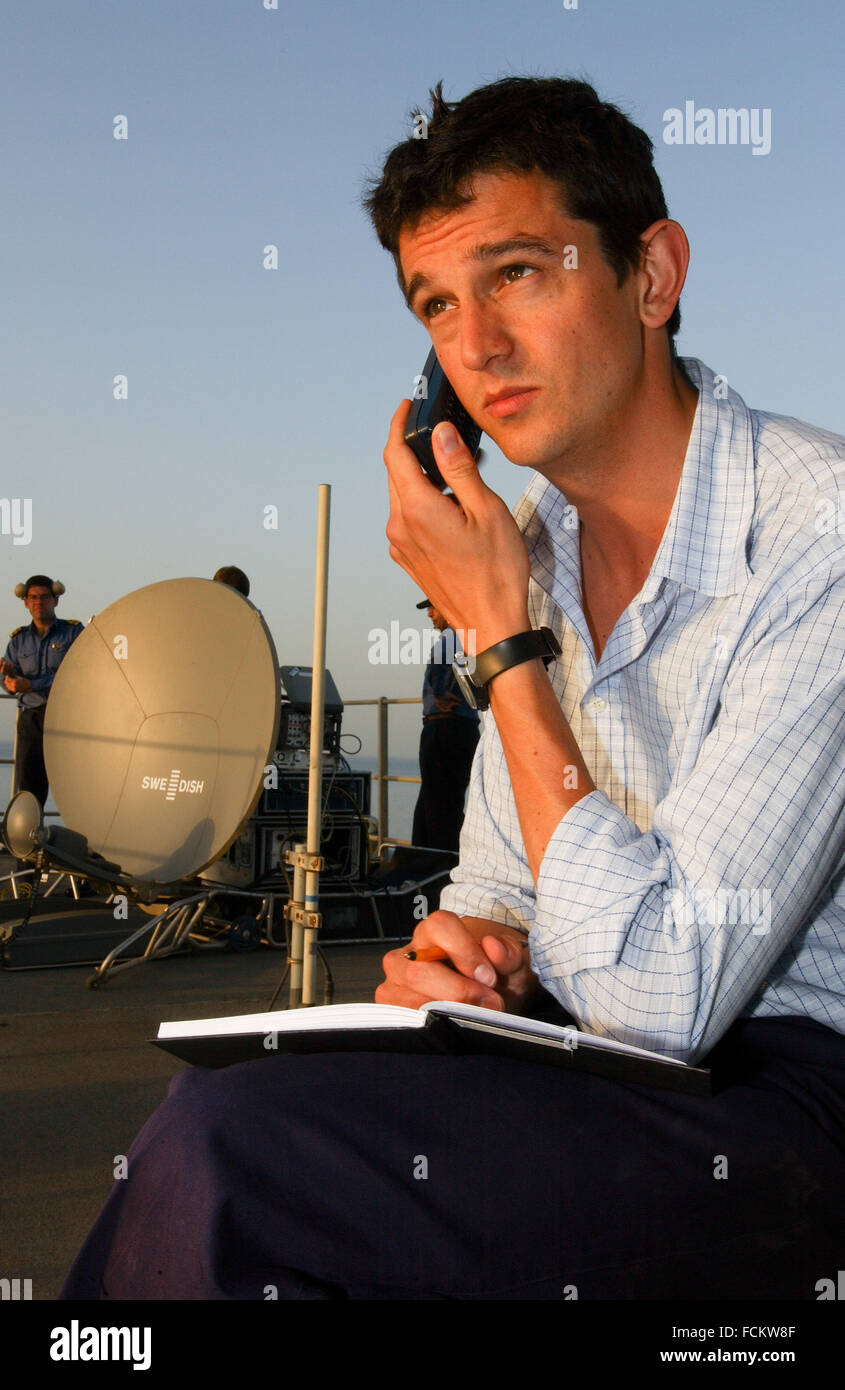 BBC reporter Matthew Price reporting from a Royal Navy warship during the Iraq War 2003 Stock Photo
