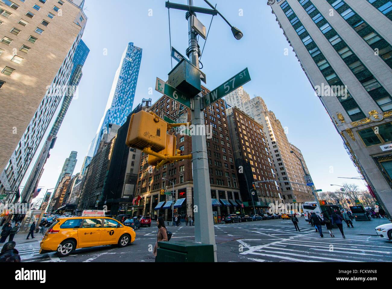 New York, USA. Corner of 6th Avenue & West 57th Street, Manhattan, with
