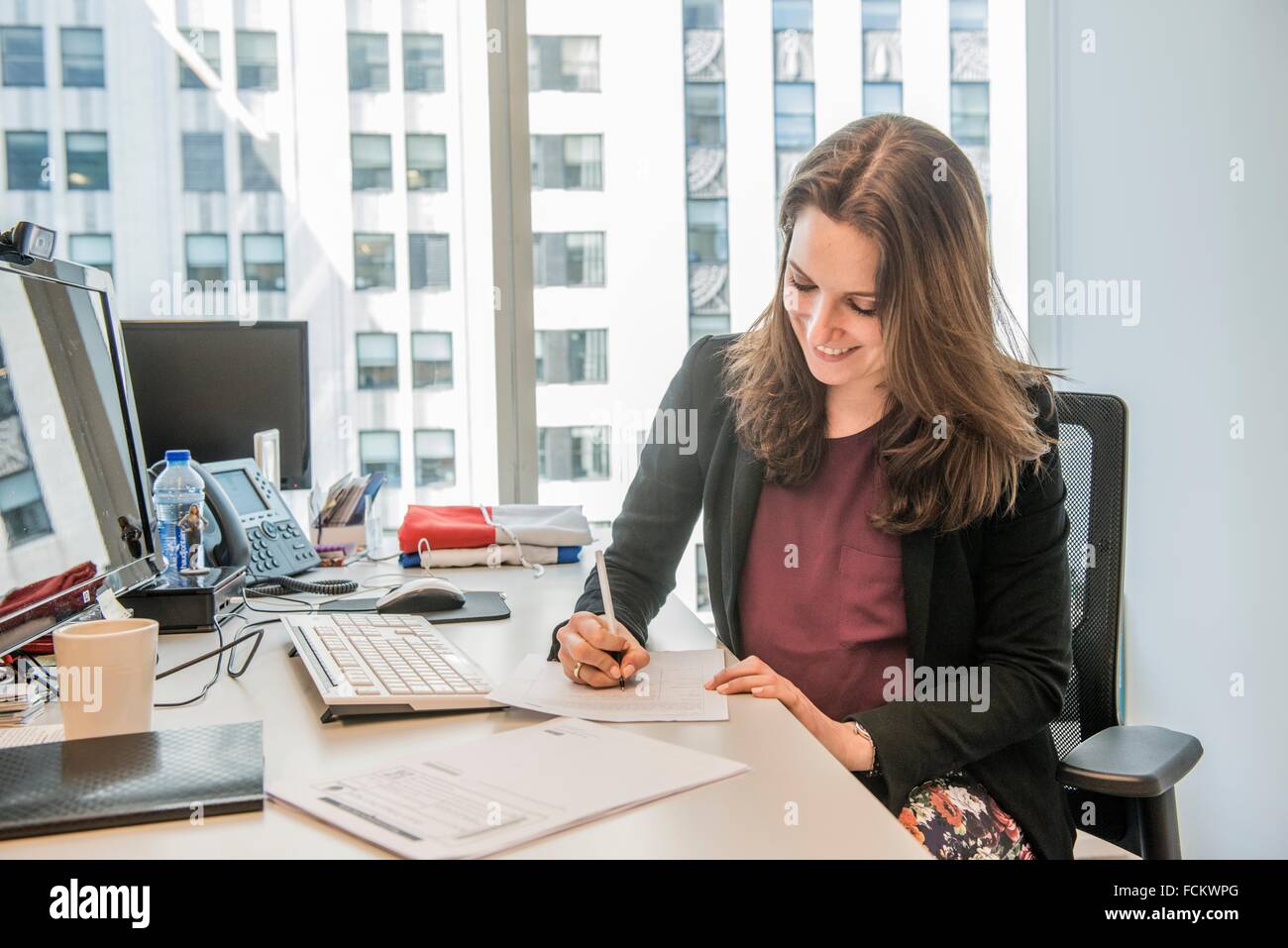 New York, USA. Female office manager to the Dutch Consulate General, down town Manhattan at her