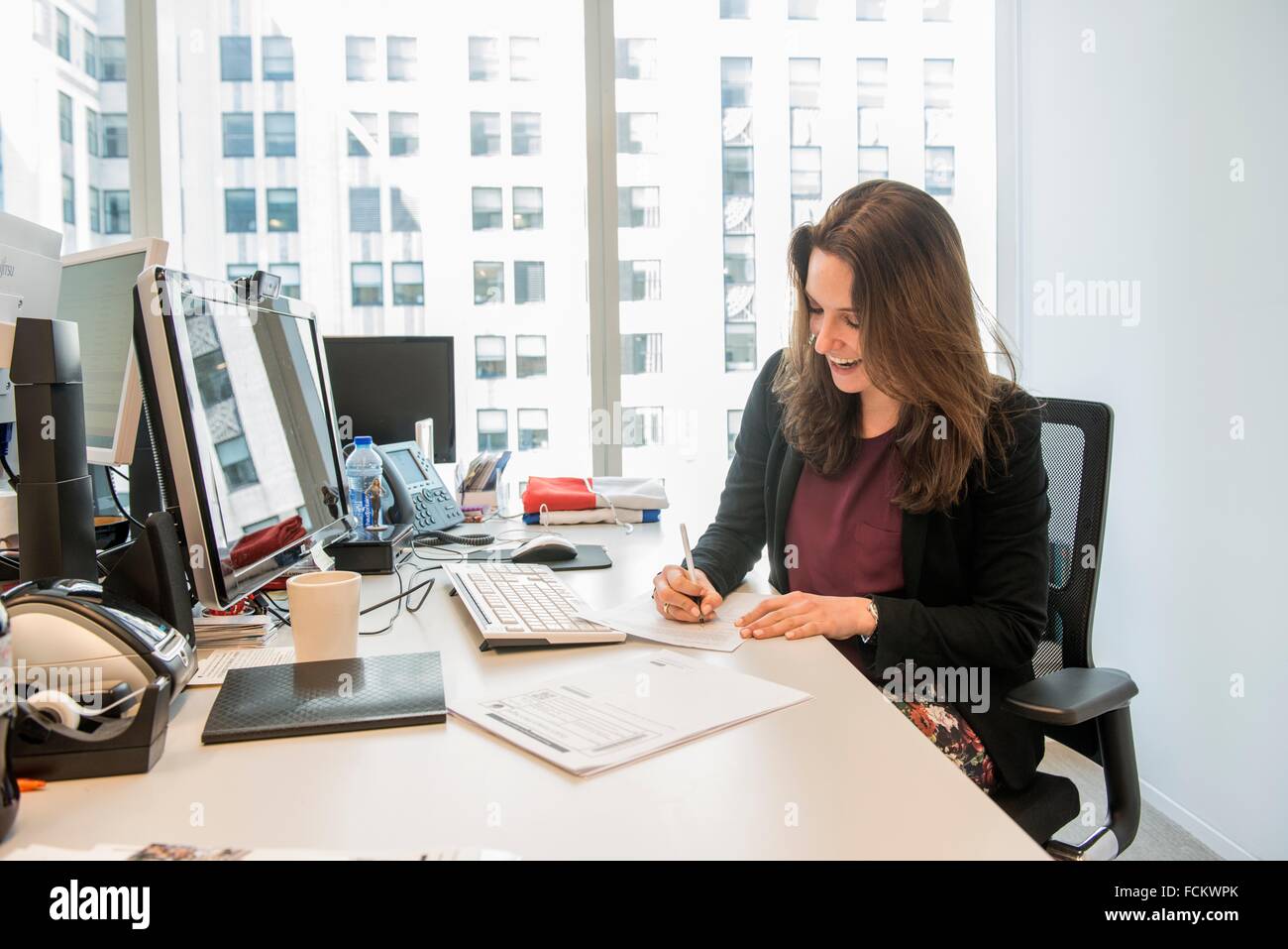 New York, USA. Female office manager to the Dutch Consulate General, down town Manhattan at her