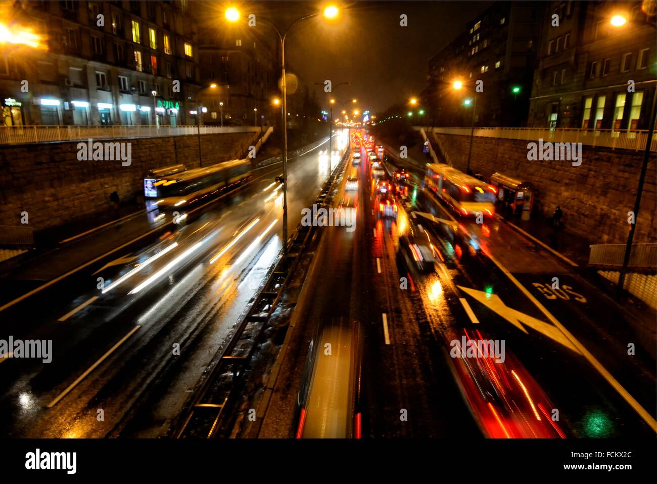 Night traffic in the city, Trasa Lazienkowska - Warsaw, Poland. Stock Photo
