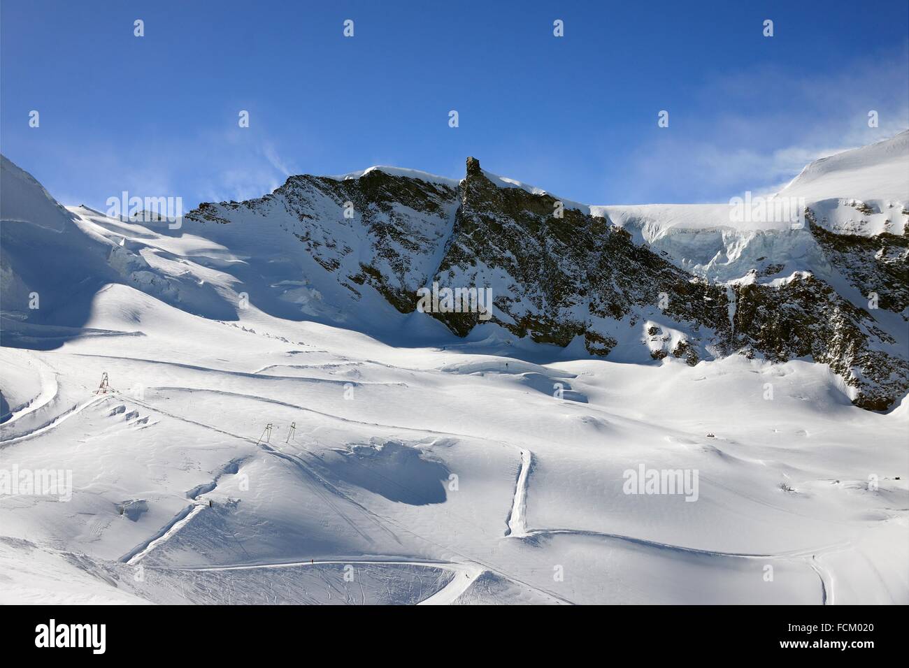 ski slopes at foot of Penine Alps, Saas-Fee, Valais, Wallis, Switzerland. Stock Photo