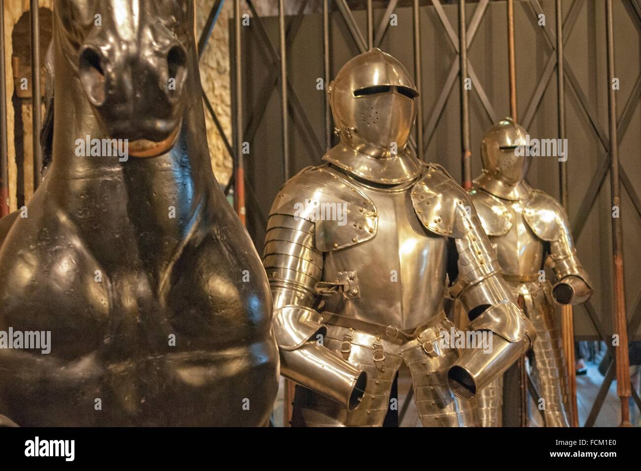 England, London, Tower of London. Suits of armour on display in the