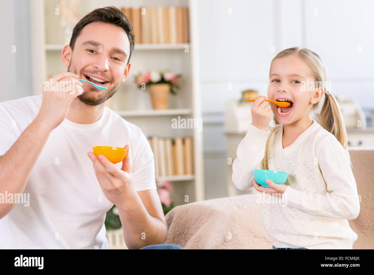 Father and daughter having fun together Stock Photo - Alamy