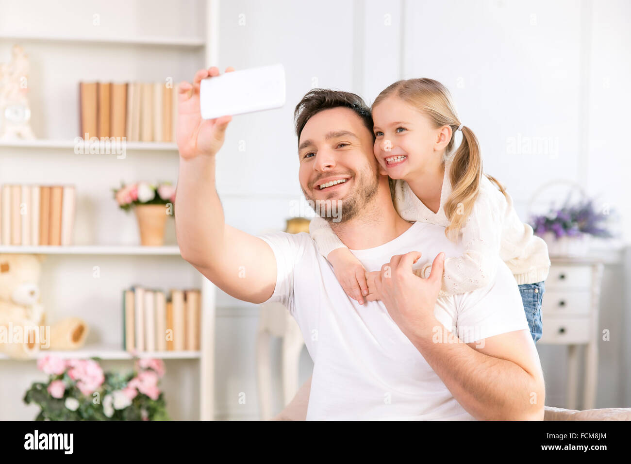 Father and daughter having fun together Stock Photo