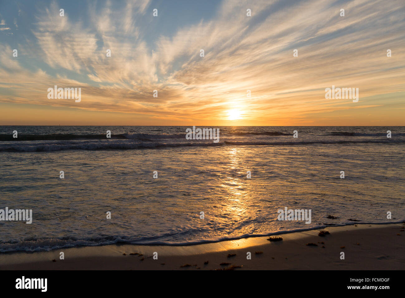 Beautiful landscaped image of sunset over sea Stock Photo - Alamy