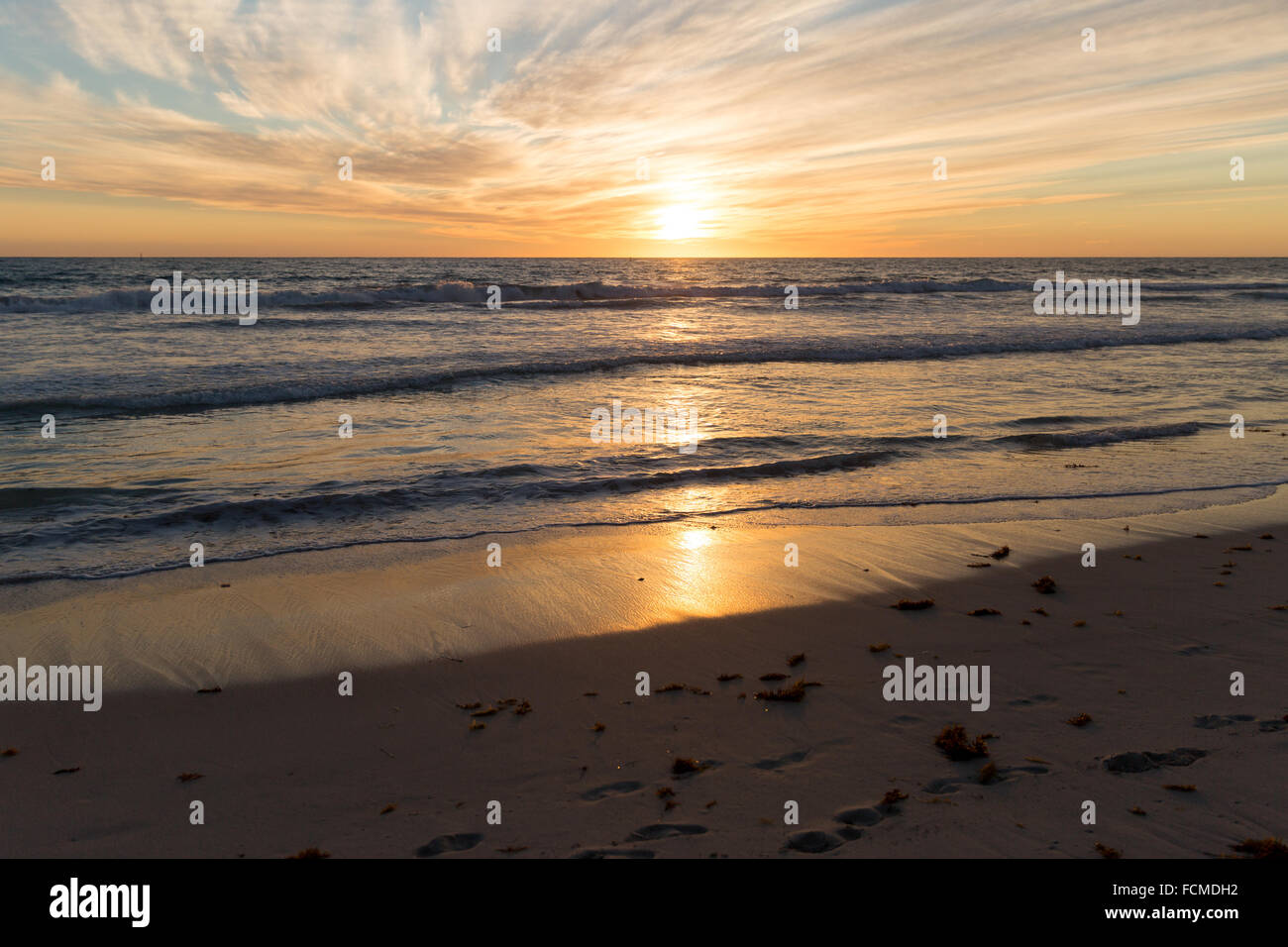 Beautiful landscaped image of sunset over sea Stock Photo - Alamy