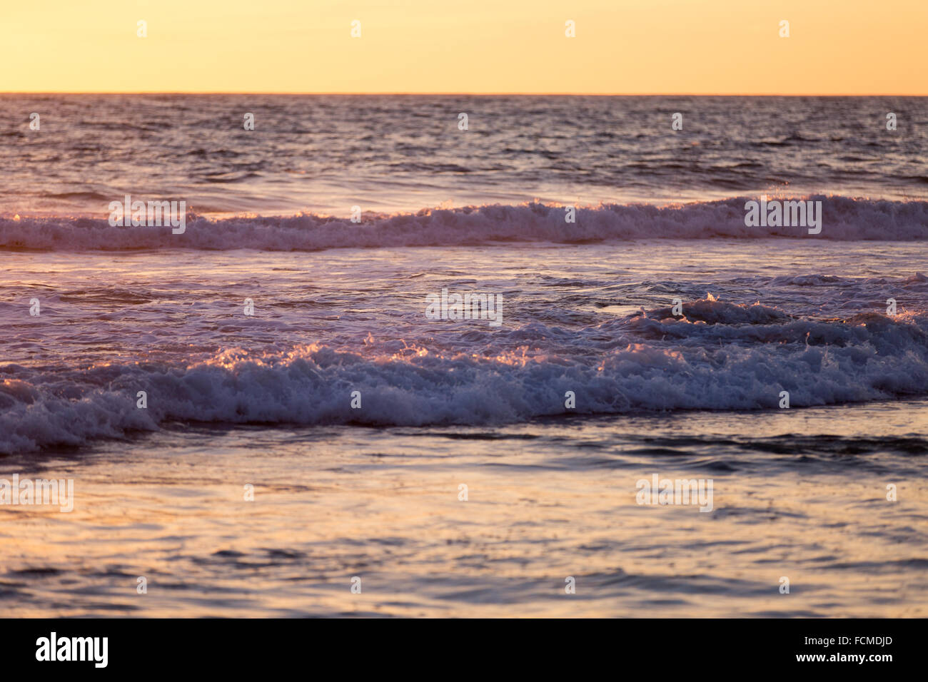 Beautiful landscaped image of sunset over sea Stock Photo - Alamy