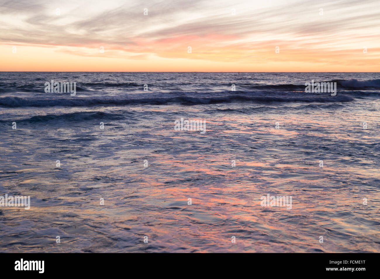 Beautiful landscaped image of sunset over sea Stock Photo - Alamy