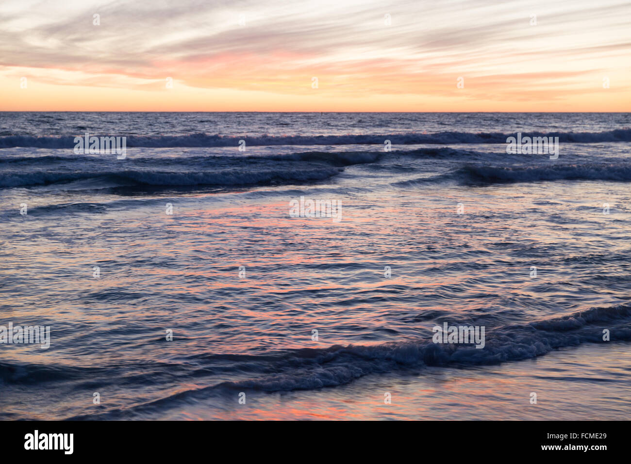 Beautiful landscaped image of sunset over sea Stock Photo - Alamy