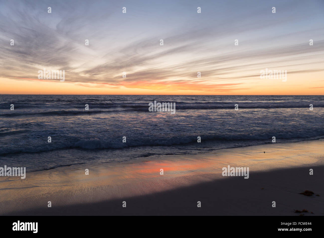 Beautiful landscaped image of sunset over sea Stock Photo - Alamy