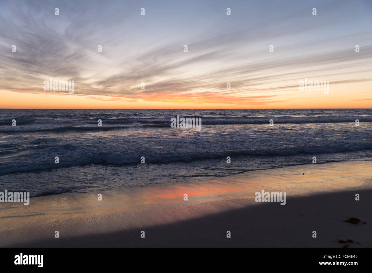 Beautiful landscaped image of sunset over sea Stock Photo - Alamy