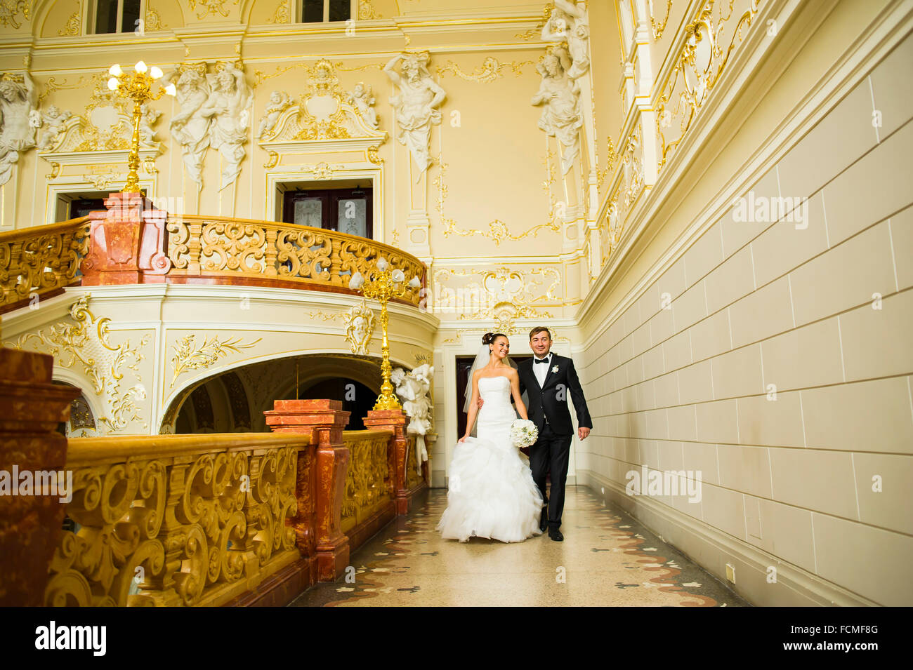 Beautiful newlyweds walking in nature hi-res stock photography and ...