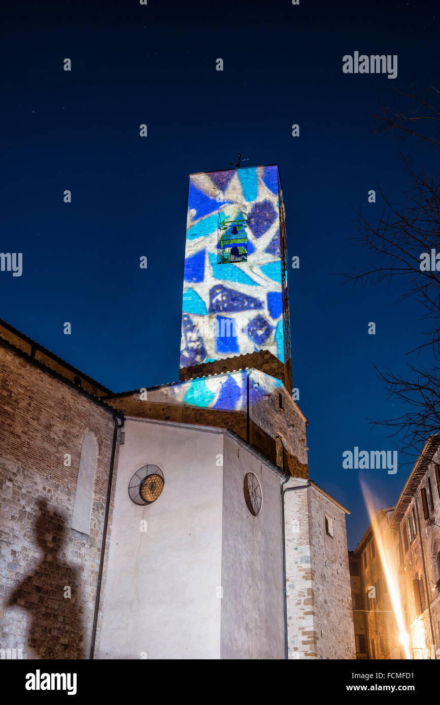 San Gimignano (Siena). Lights of artist reflected on in one of its numerous towers for San Gimignano Lumière. Stock Photo