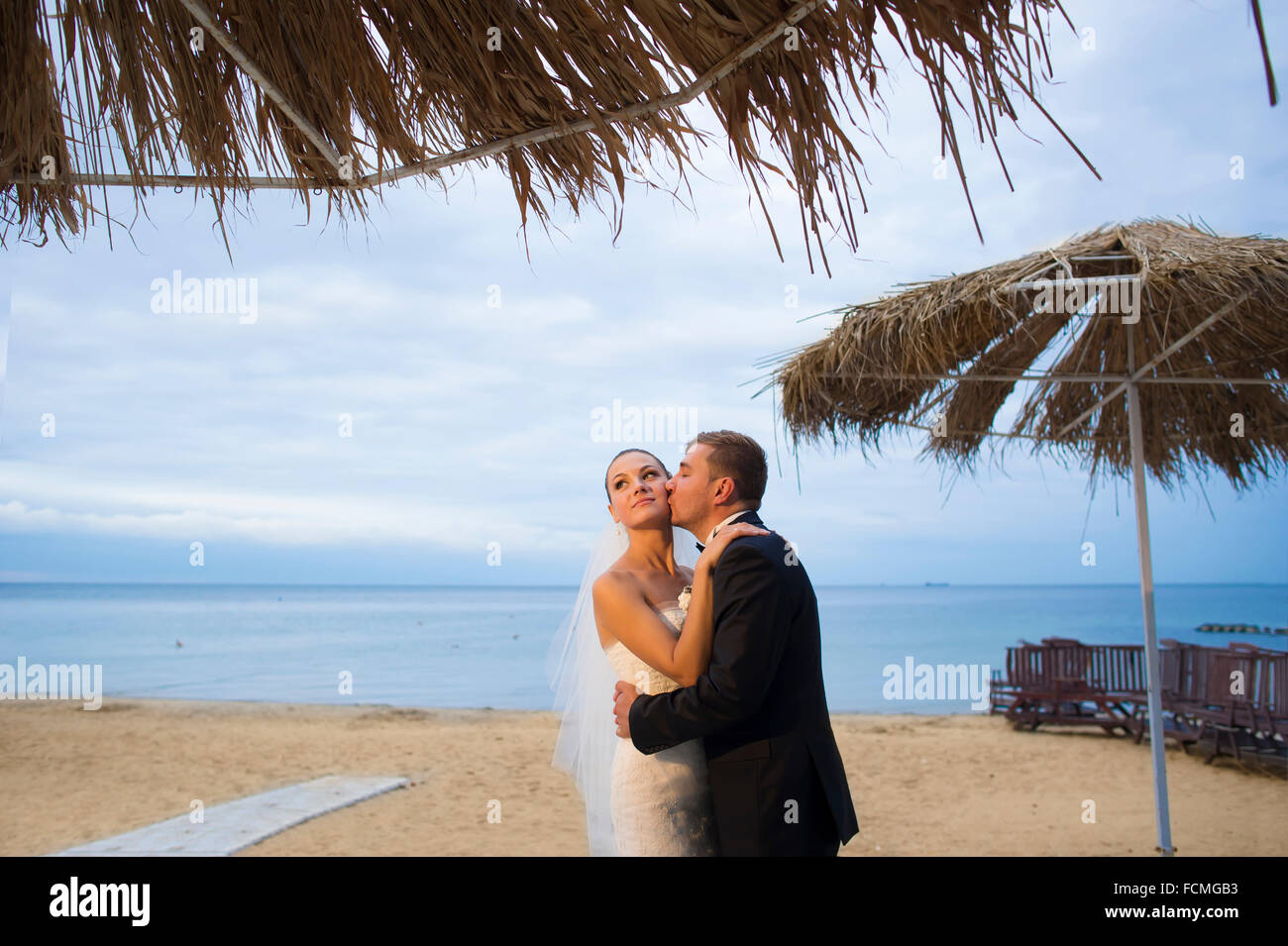 Newlyweds on beach in hi-res stock photography and images - Alamy