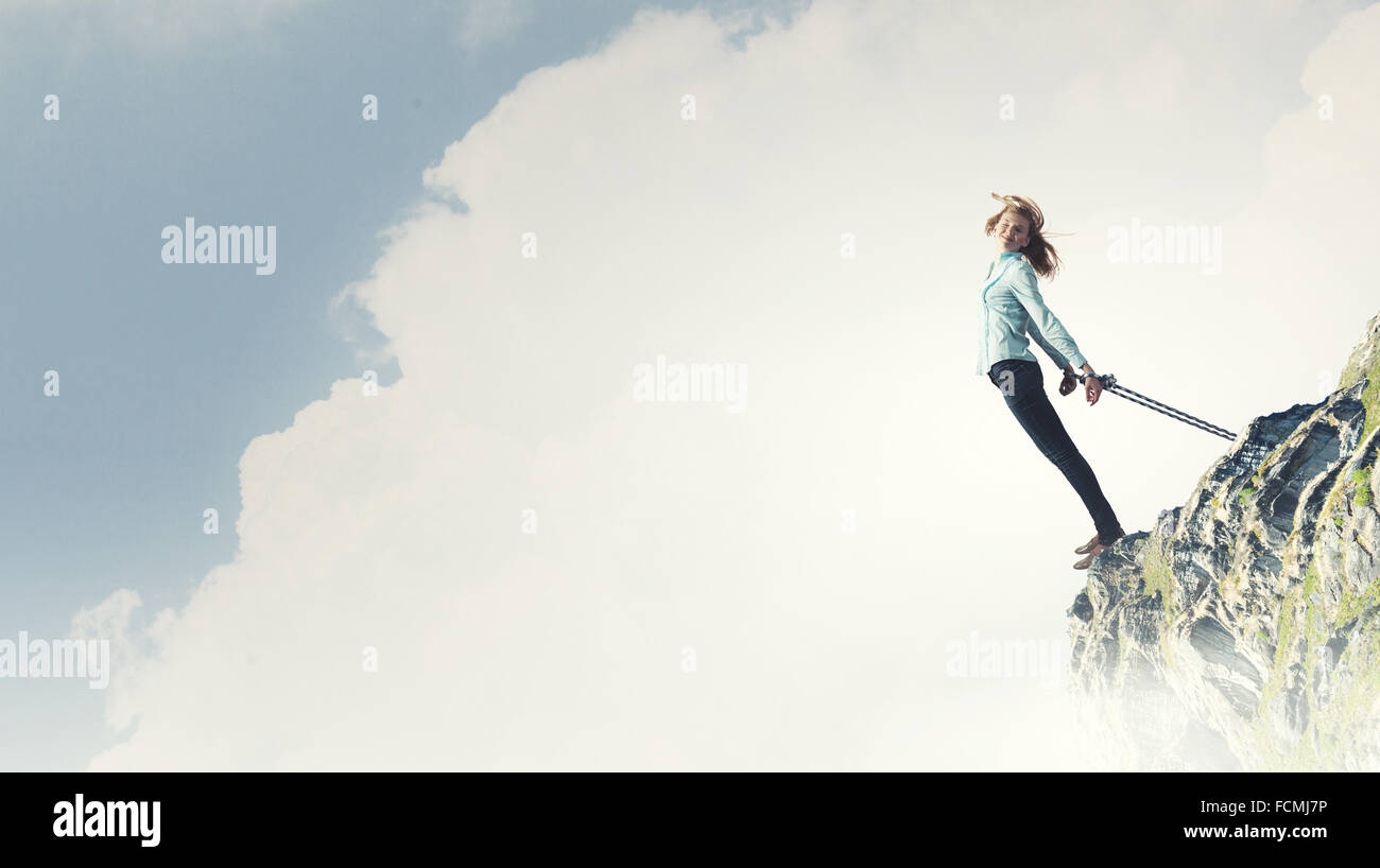 Flying Ropes Girl Young girl with ropes on hands trying to fly Stock Photo - Alamy