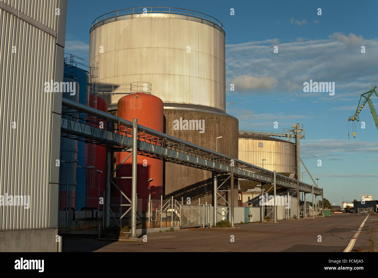 Oil tanks storing edible oils like fish oil. Colored tanks and