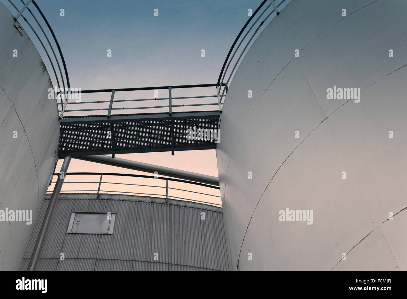 Oil tanks storing edible oils like fish oil. Colored tanks and