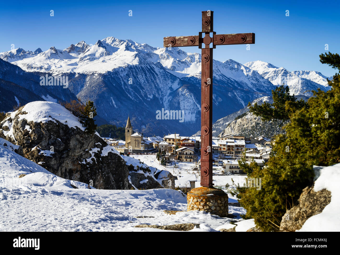 View of Aussois sur Arc village and cross, France Stock Photo