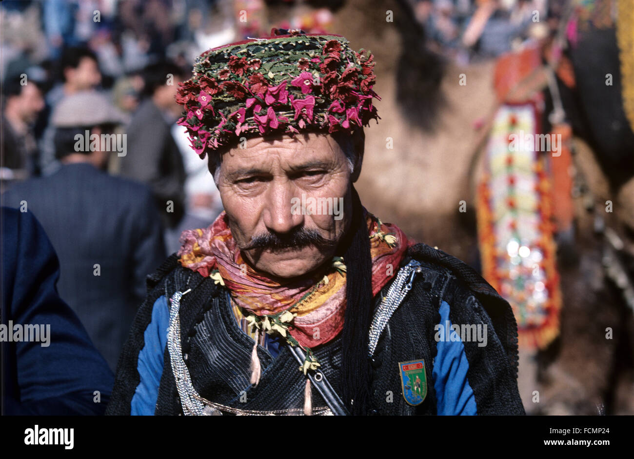 Portrait of a Turkish Men Wearing a Moustache and Traditional Turkish Dress, or Traditional Aegean Military Costume, known as Zeybek and Head Wear at the Annual Camel Wrestling Championship, Ephesus, Turkey Stock Photo