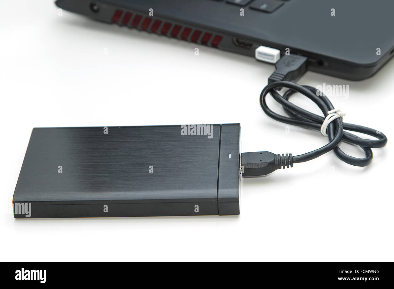 external hard disk connect to computer notebook Stock Photo Alamy
