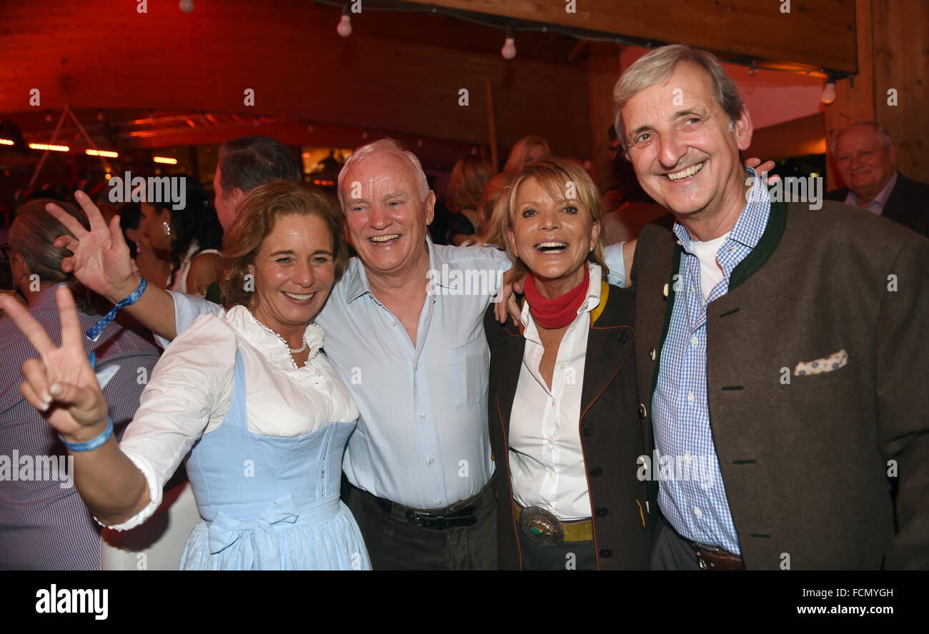 Going, Austria. 22nd Jan, 2016. Werner Baldessarini, former CEO of Hugo Boss AG, and his wife Cathrin (l) as well as actress Uschi Glas and her husband Dieter Hermann (r) posing at the 25th Weisswurst party at Stanglwirt hotel in Going, Austria, 22 January 2016. Photo: Felix Hoerhager/dpa/Alamy Live News Stock Photo