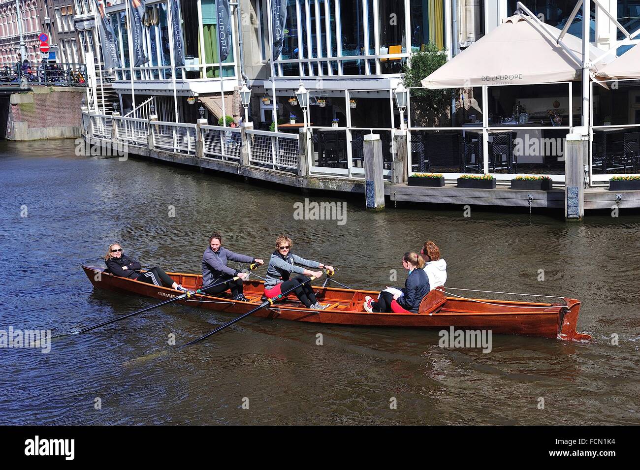 A female team rowing in a canal. Amsterdam, Netherlands Stock Photo Alamy