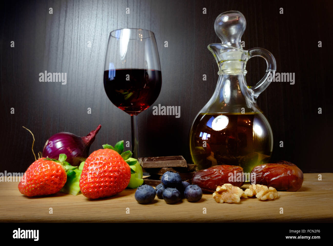 Delicious sirtfoods, red wine and chocolate Stock Photo