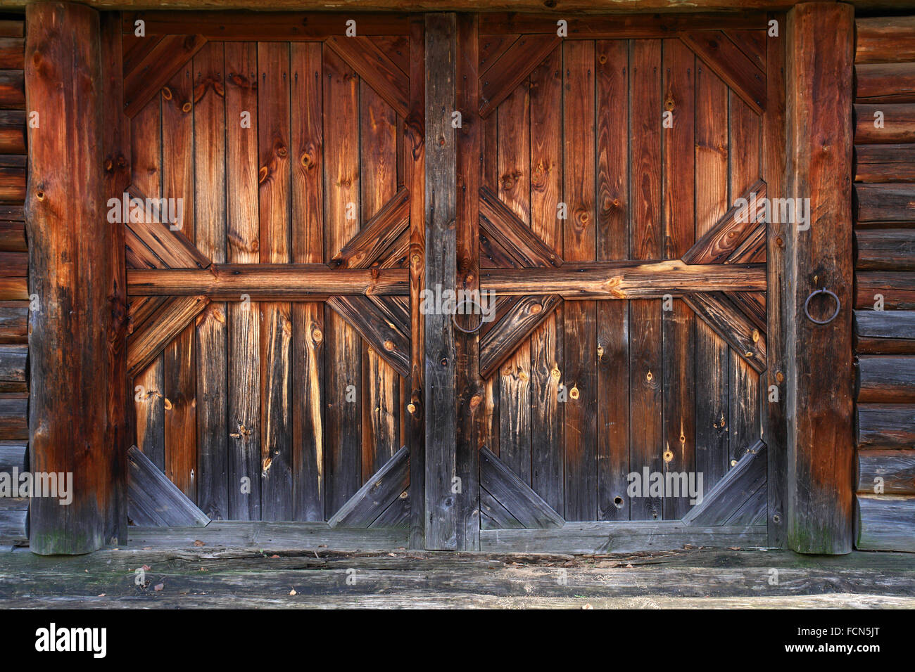 Barn gate of 19th century. Interesting craftsmanship of Russian wood master. Museum of wood craftsmanship in Suzdal. Stock Photo