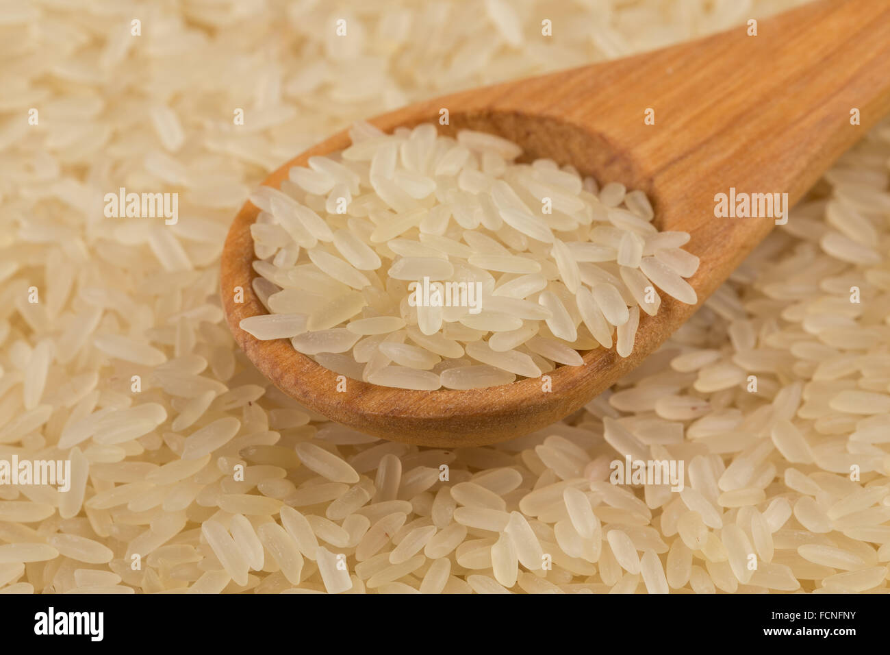 spoon of rice on puffed rice cereal background close up Stock Photo Alamy