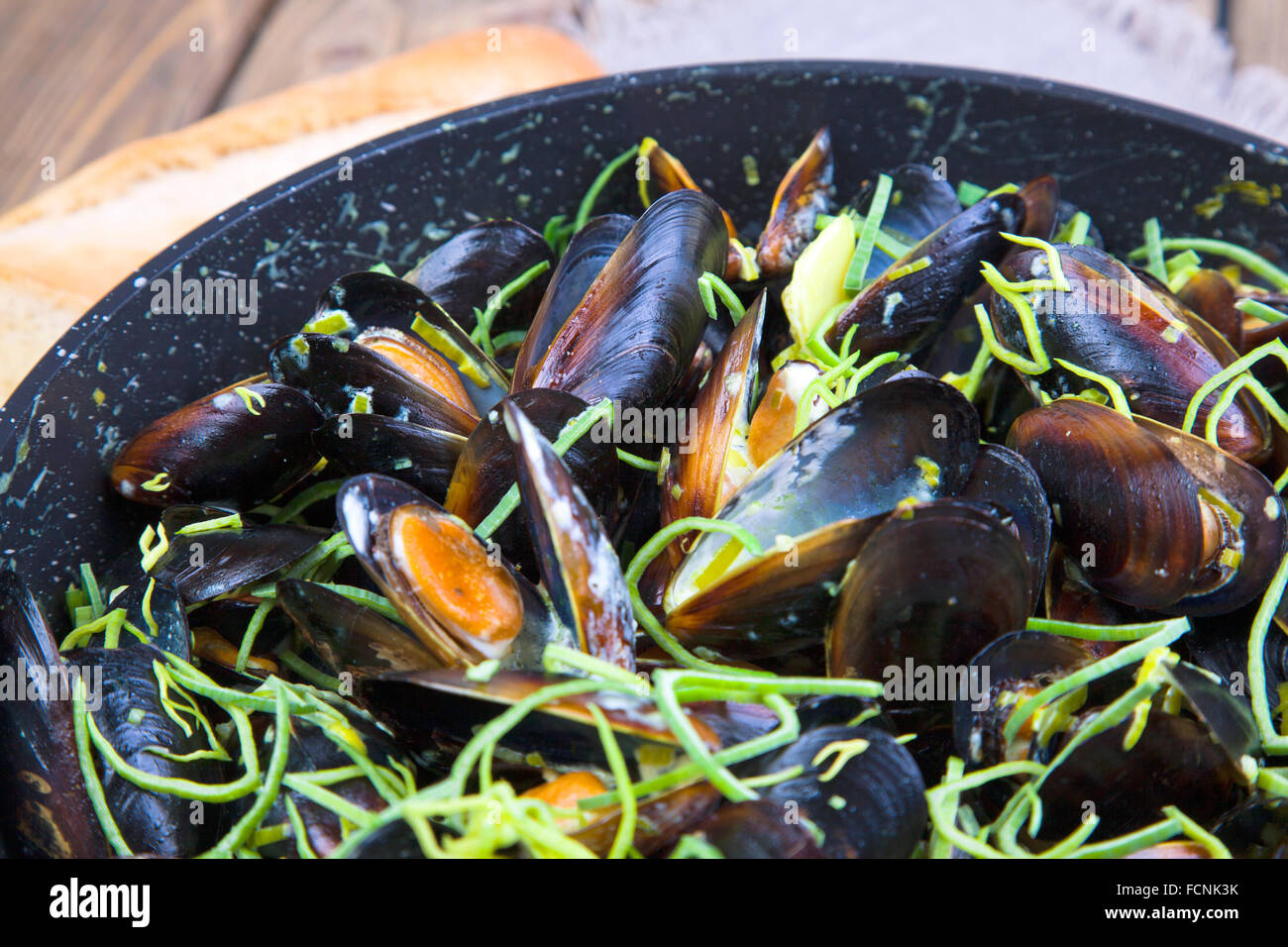 Mussels cooked in wine Stock Photo Alamy