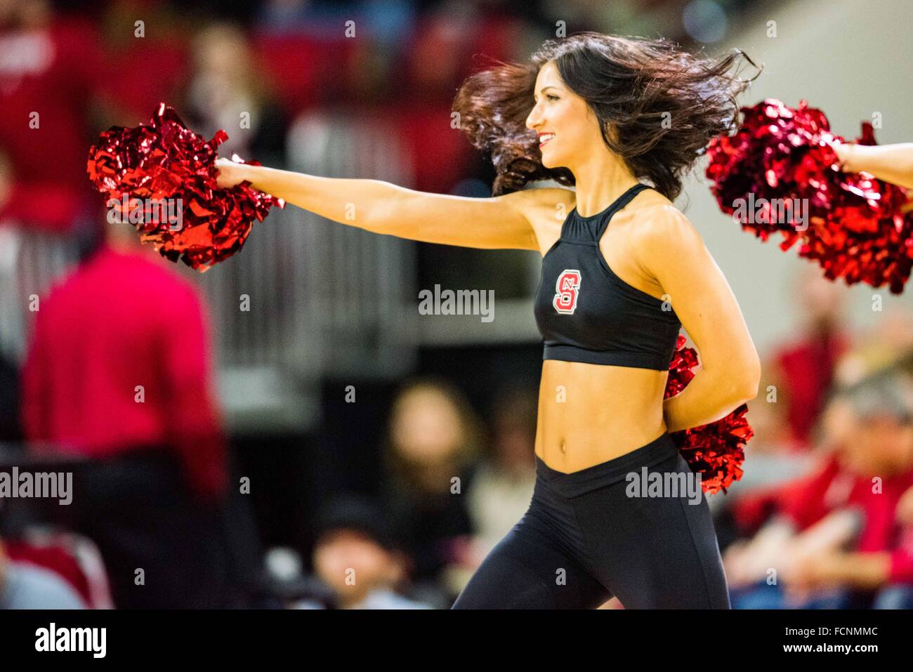 An NC State cheerleader during the NCAA Basketball game between the Duke Blue Devils and the NC State Wolfpack at PNC Arena on January 23, 2016 in Raleigh, NC. Jacob Kupferman/CSM Stock Photo