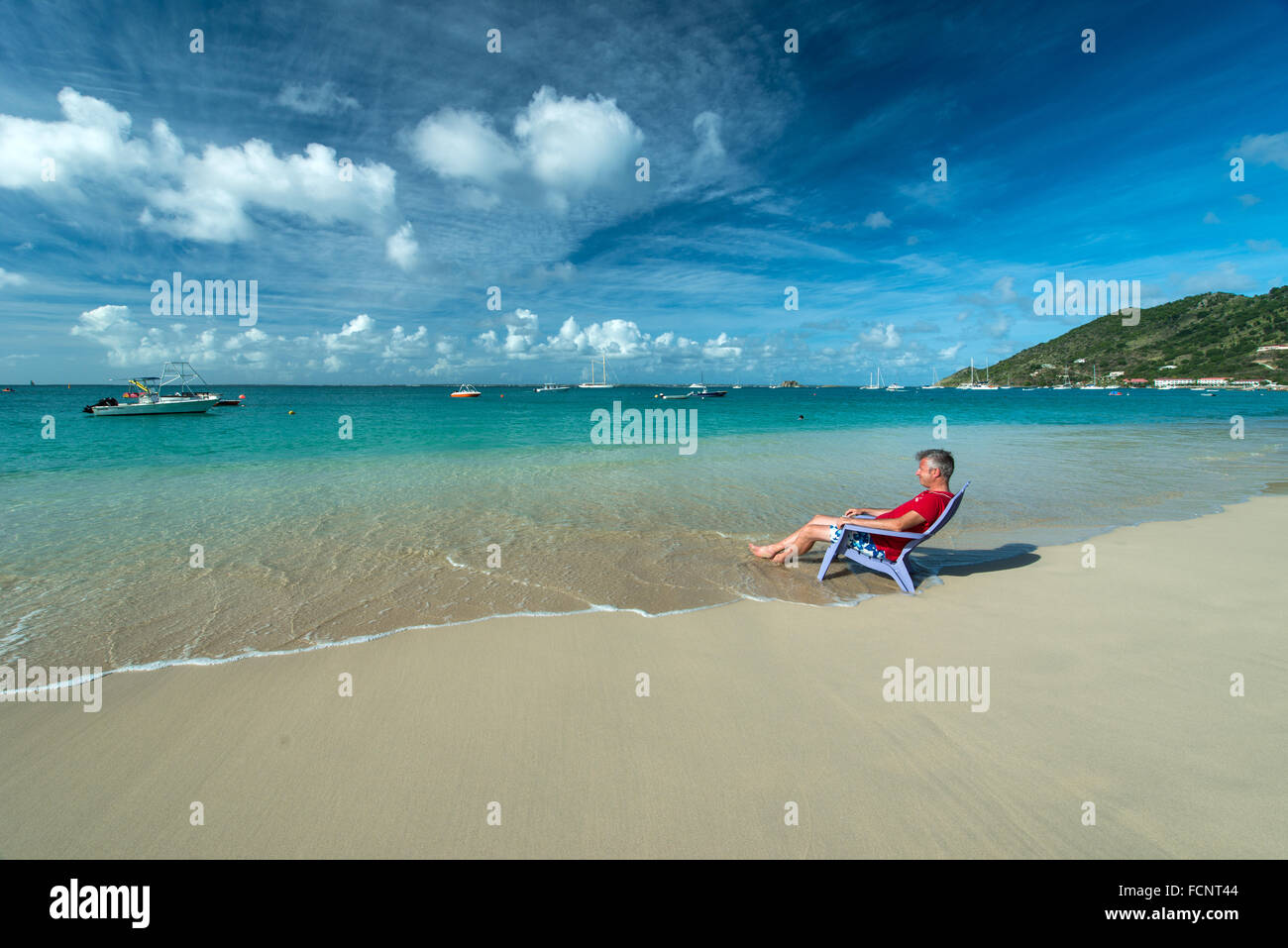 Caribbean man beach hi-res stock photography and images - Alamy
