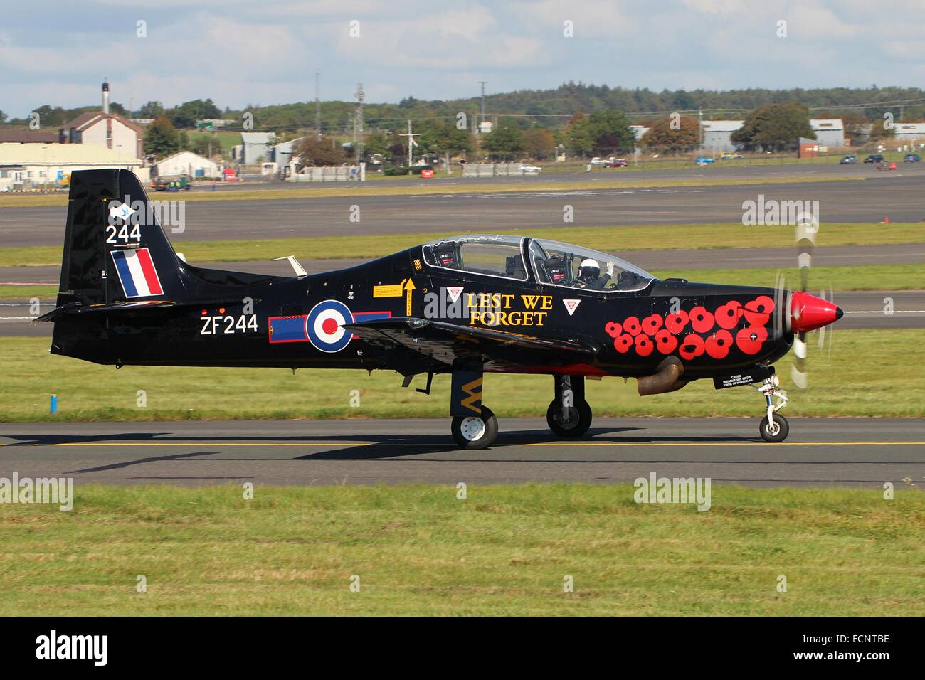 ZF244, the RAF Tucano display aircraft for 2014, taxis out for departure at Prestwick International Airport. Stock Photo