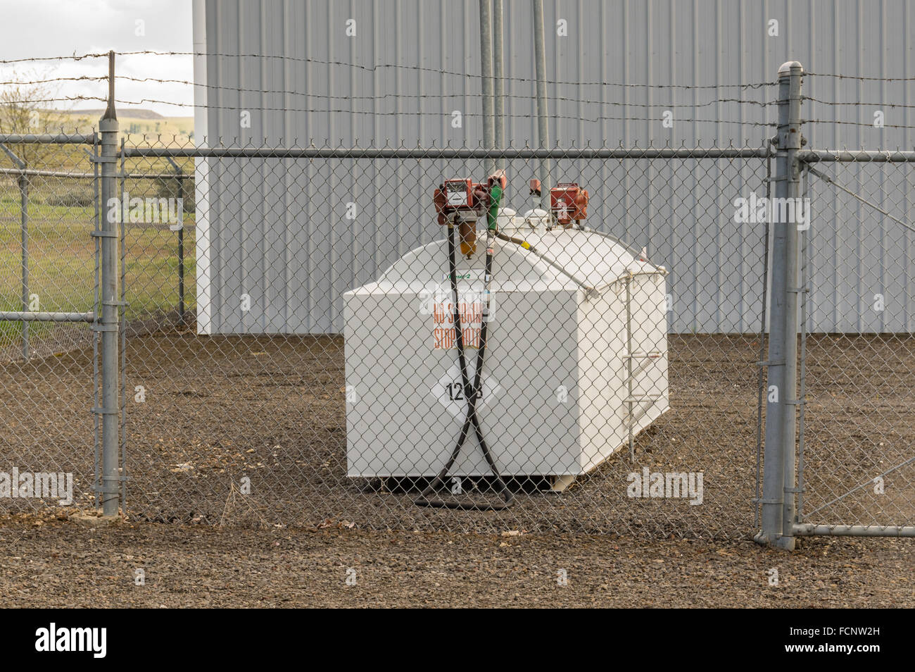 Fuel tank and pump contained in a safety enclosure. Antelop, Oregon