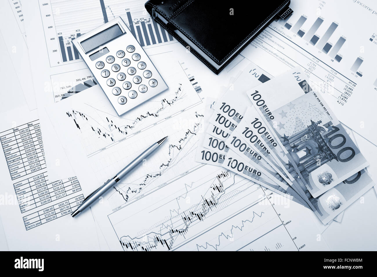 financial charts and graphs on the table Stock Photo - Alamy