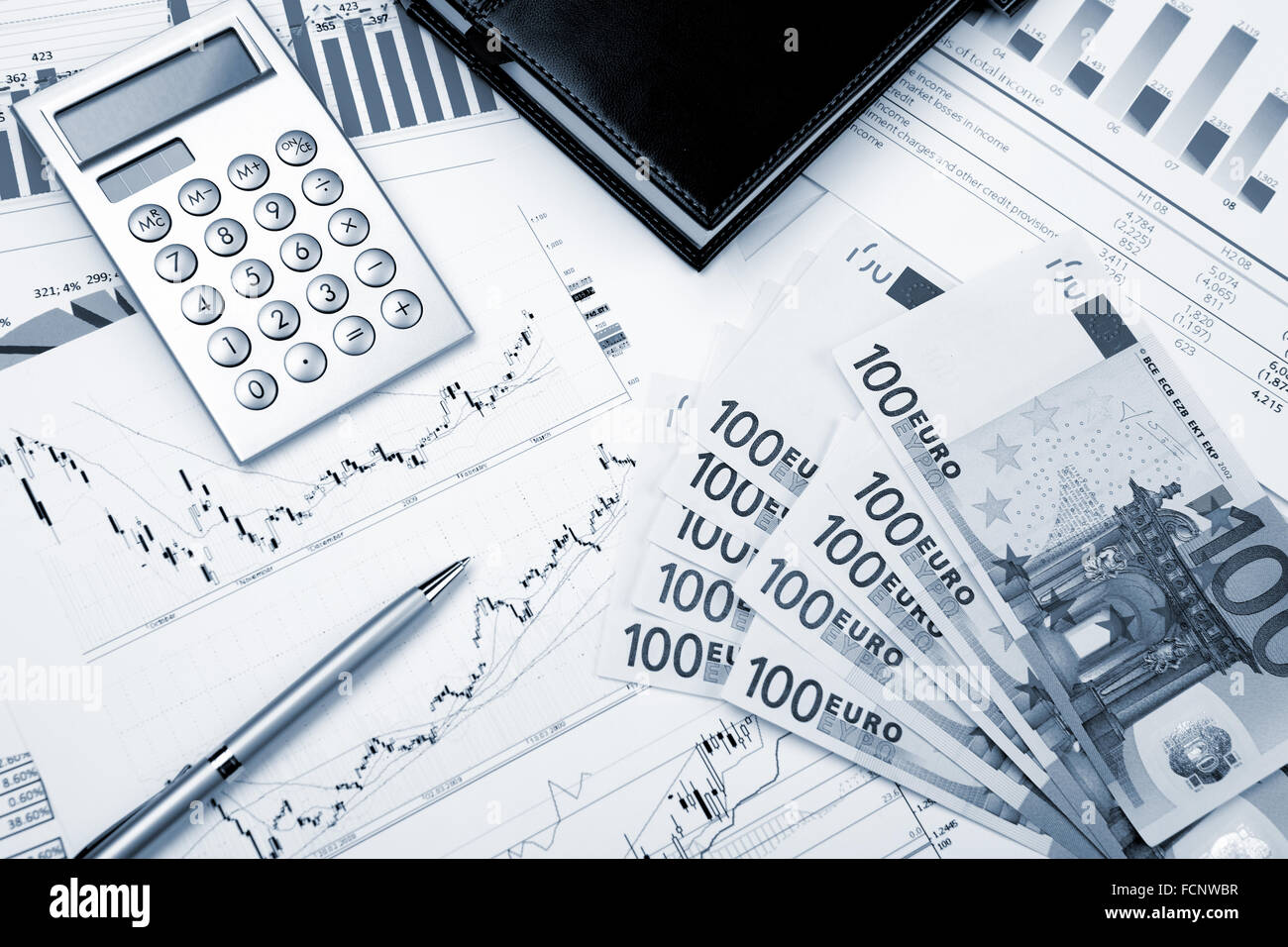 financial charts and graphs on the table Stock Photo - Alamy
