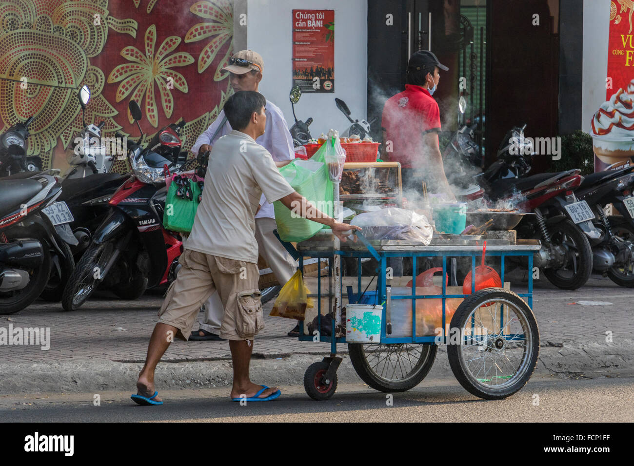 Mobile vendor moving around district one in Ho Chi Minh city Vietnam