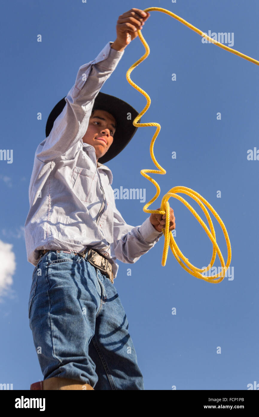 Charro Rodeo Ropes A Mexican charro or cowboy practices roping skills on his horse before ...
