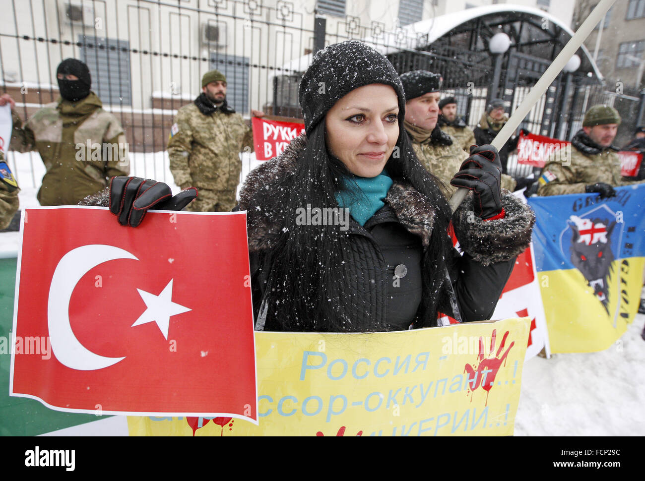Kiev, Ukraine. 23rd Jan, 2016. Activists from Ukrainian voluntary battalions 'Georgia national legion', Chechen battalion named of Dzhokhar Dudayev, and their supporters during protest against the politics of Russian President Vladimir Putin, in front the Russian Embassy. © Vasyl Shevchenko/Pacific Press/Alamy Live News Stock Photo